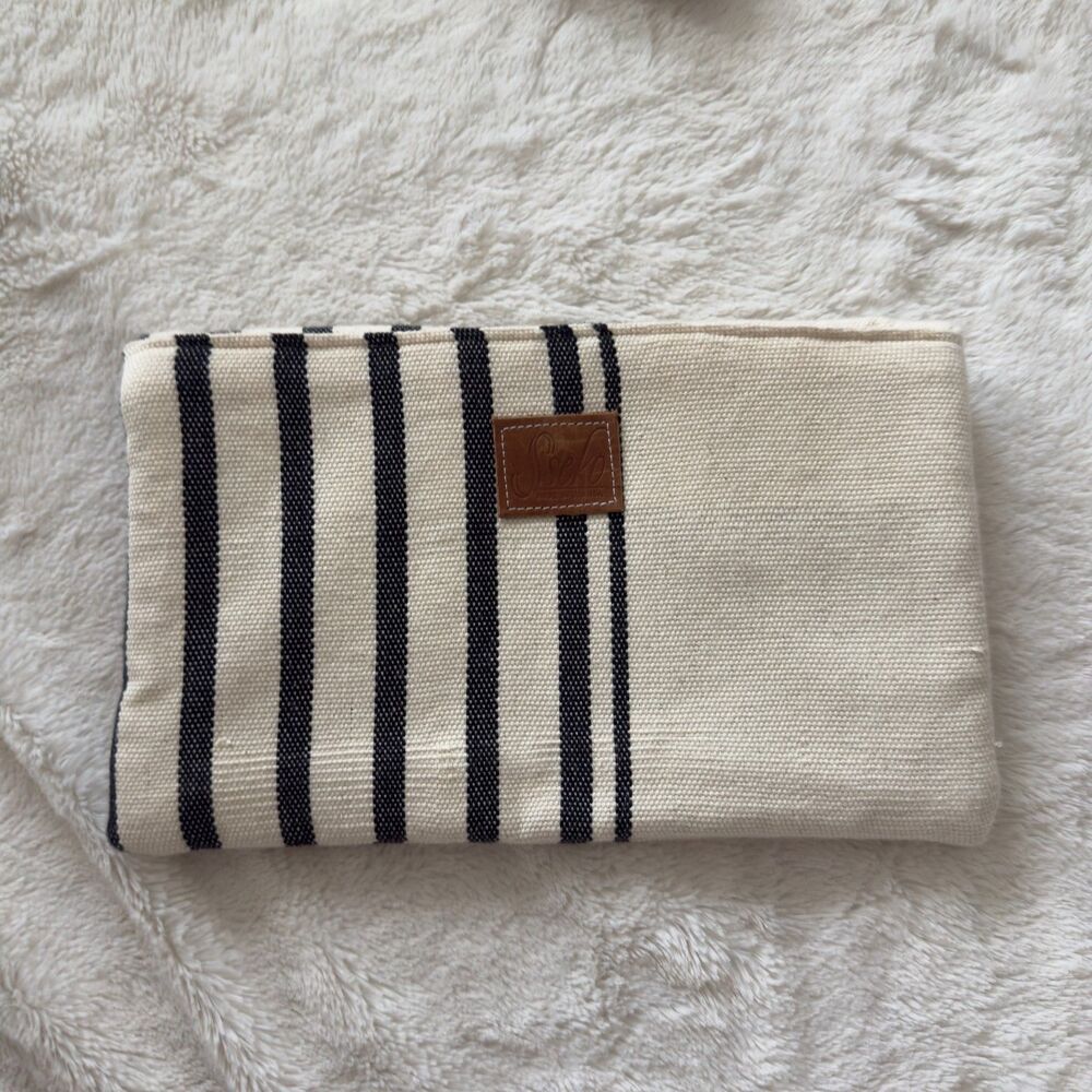 Sseko cream and black striped canvas clutch